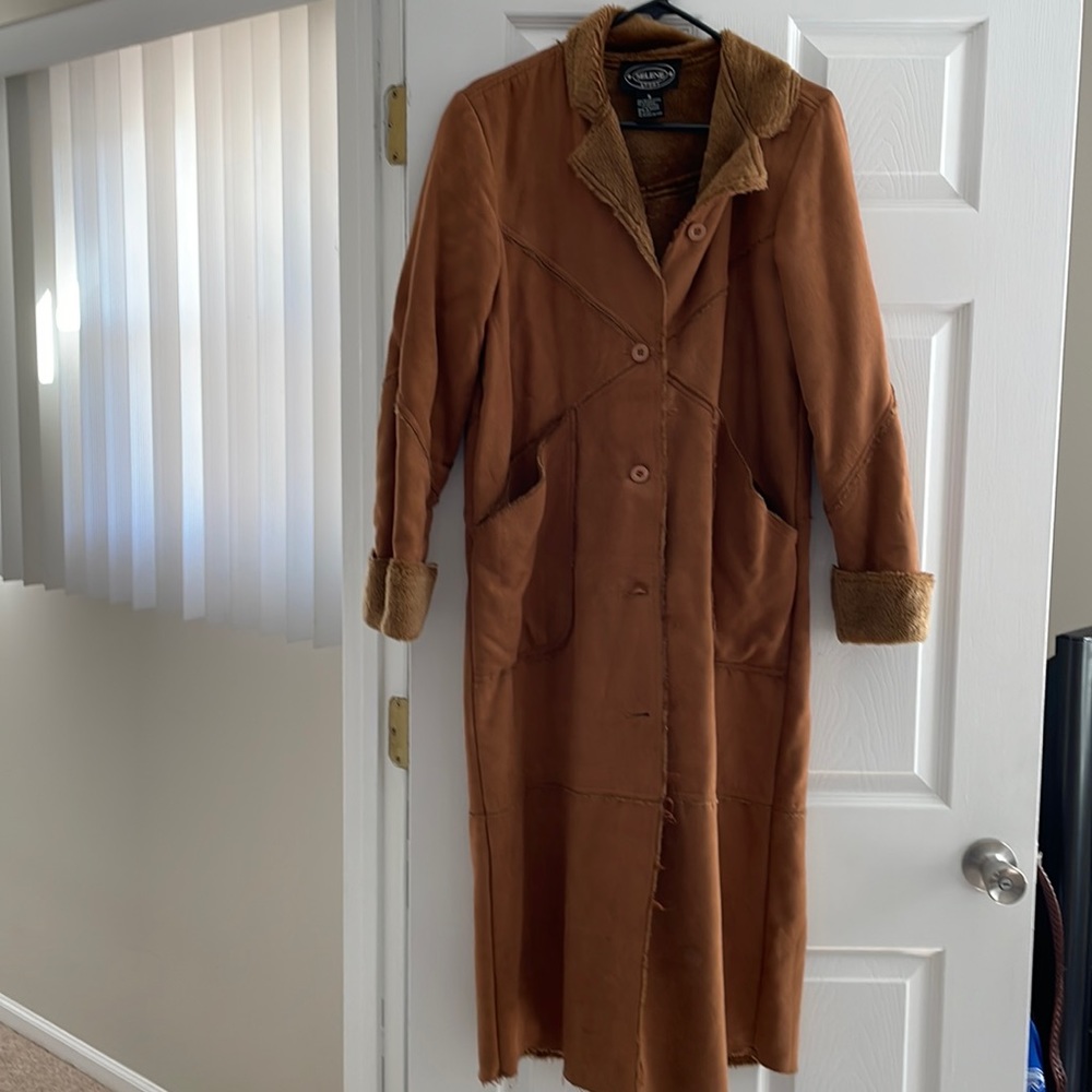Long camel colored suede coat - lined inside and cuffs. Size small